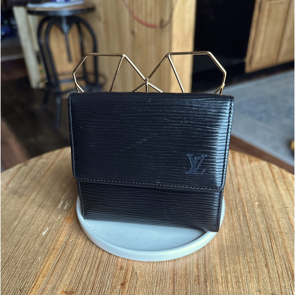 Louis Vuitton EPI in black trifold wallet. Excellent condition.